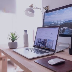A well-organized home office with a comfortable desk, chair, and proper lighting to enhance productivity.